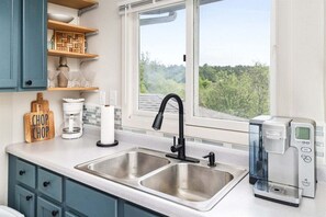 Microwave, oven, stovetop, coffee/tea maker - Bayfield Suite at Ferry Landing Suites in Downtown (La Pointe)
