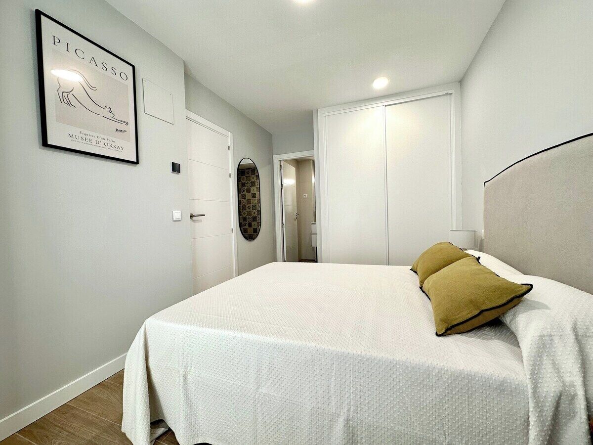 2 dormitorios, tabla de planchar con plancha, cuna de viaje y wifi