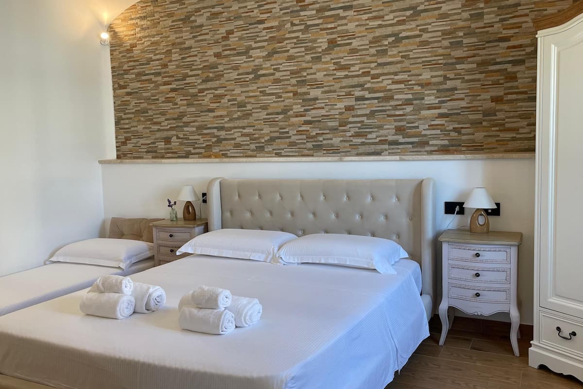 Chambre Triple | 1 chambre, literie de qualité supérieure, minibar, rideaux occultants