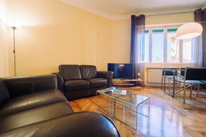 Apartment | Living area | 35-cm TV with digital channels - Elegant Apartment in the Center by Wonderful Italy (Sanremo)
