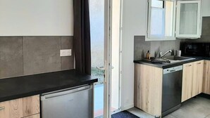 A modern kitchen with a dishwasher, sink, and cabinets. - Bed &breakfast in a peaceful natural setting swimming pool guaranteed relaxation (Dauphin)