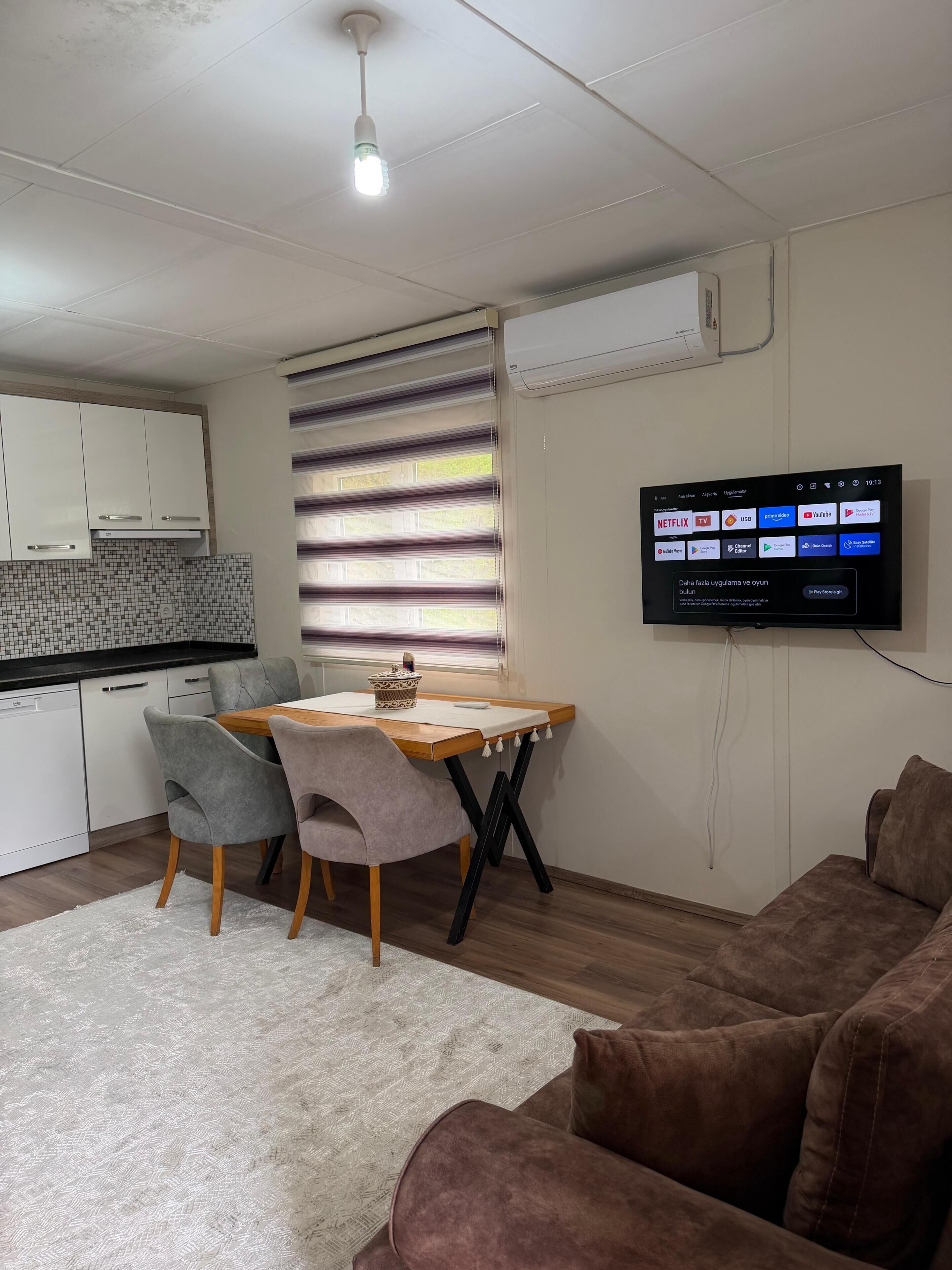 Family Cottage, Valley View | Living area | 35-inch LCD TV with cable channels