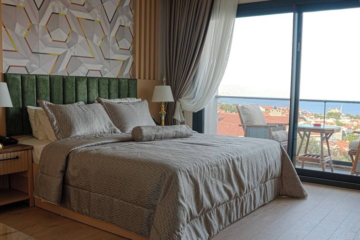 Family Oda, 2 Yatak Odası, Balkon, Deniz Manzaralı | Kaliteli yatak takımı, memory foam (visko elastik) yatak, minibar 