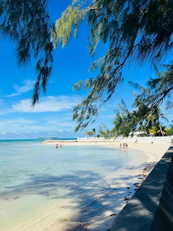 On the beach, sun-loungers, beach towels