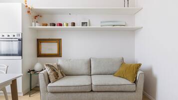 Apartment, Balcony | Living area | 35-inch TV with digital channels