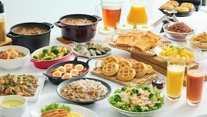 A variety of dishes including soups, salads, and waffles, suggesting a buffet-style meal setup. - Comfort Inn Himeji Yumesakibashi (Himeji)