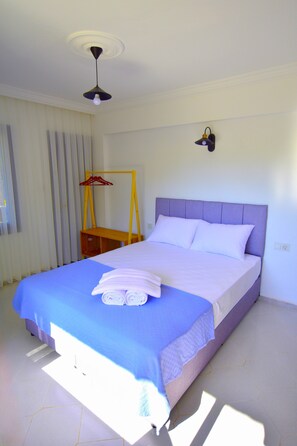 Quarto casal conforto, vista para o jardim | Wi-Fi de cortesia