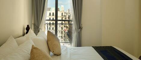 Appartement familial, vue sur la ville | Literie de qualité, lit avec matelas à plateau-coussin