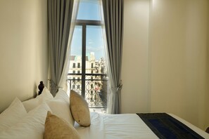 Apartamento familiar, vistas a la ciudad | Ropa de cama de alta calidad y colchones con acolchado adicional