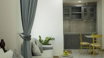 Family Triple Room, City View | Private kitchen | Fridge, dishwasher, coffee/tea maker, electric kettle