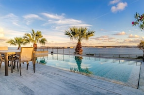 Outdoor dining - Fortress Villa w/3 Pools, Hot tub & Lagoon views (Ghajnsielem)