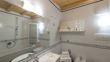 Hair dryer, bidet, towels, soap