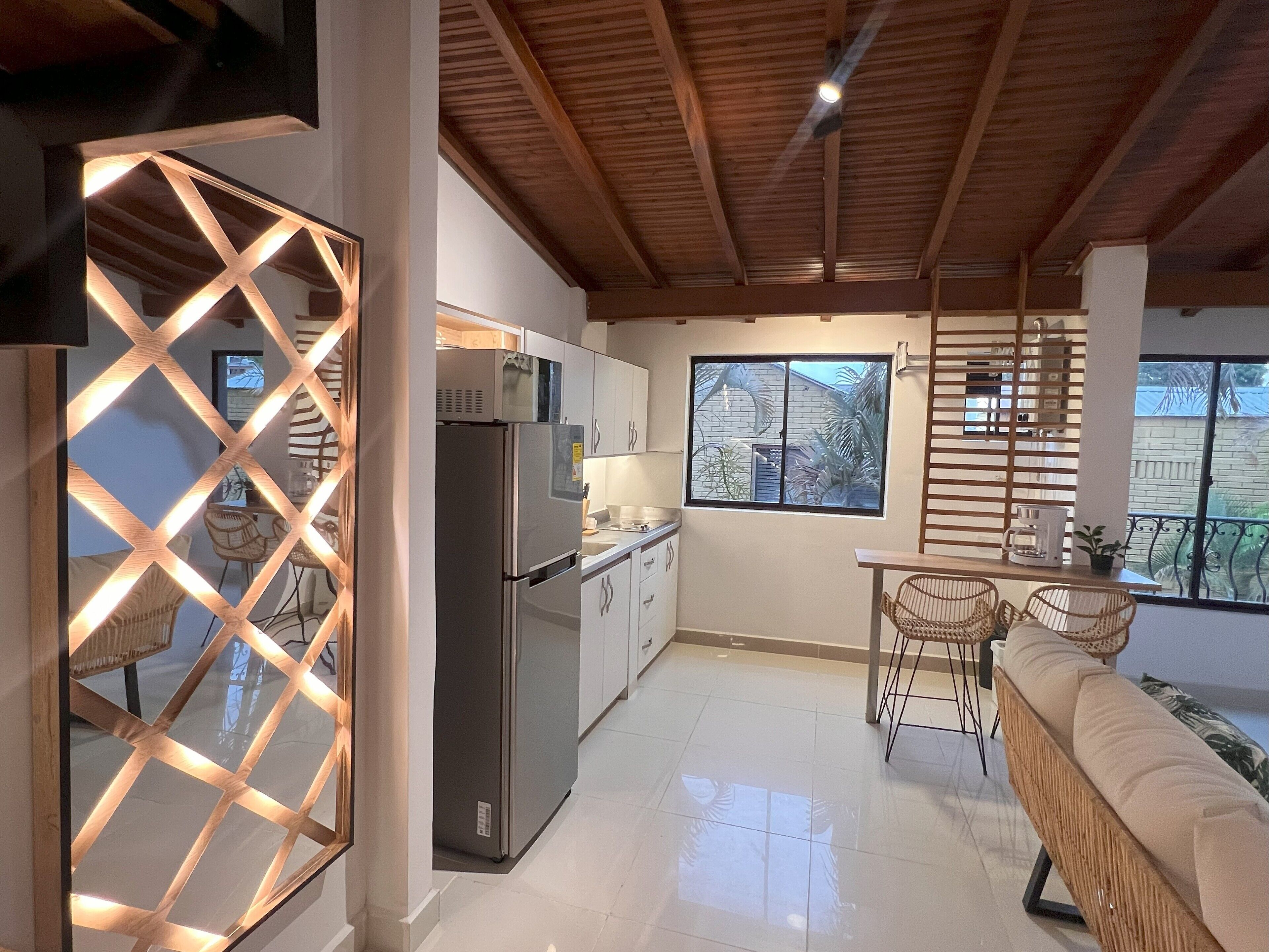 Fridge, microwave, stovetop, coffee/tea maker