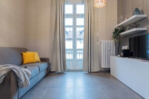 Living area - Einaudi Apartment by Wonderful Italy (Turin)