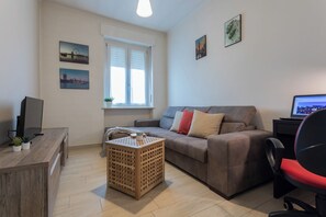 Appartement | Coin séjour | Télévision de 35 pouces avec chaînes numériques