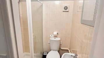 Shower, towels, soap, toilet paper