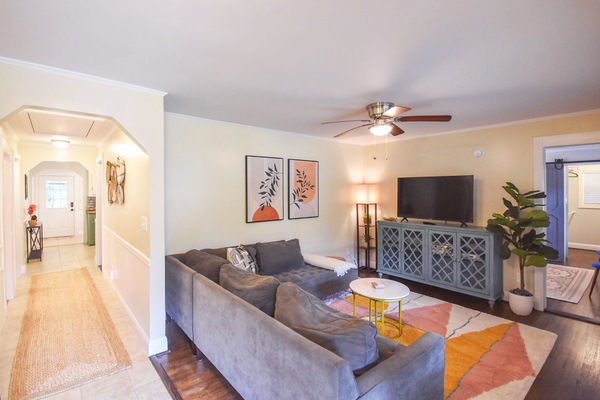 The cozy living room anchors the home.