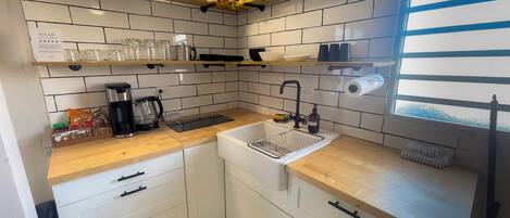 Fridge, microwave, stovetop, coffee/tea maker