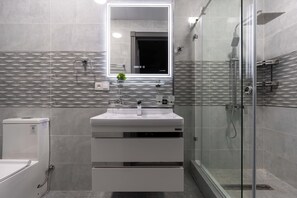 Hair dryer, towels, soap, shampoo