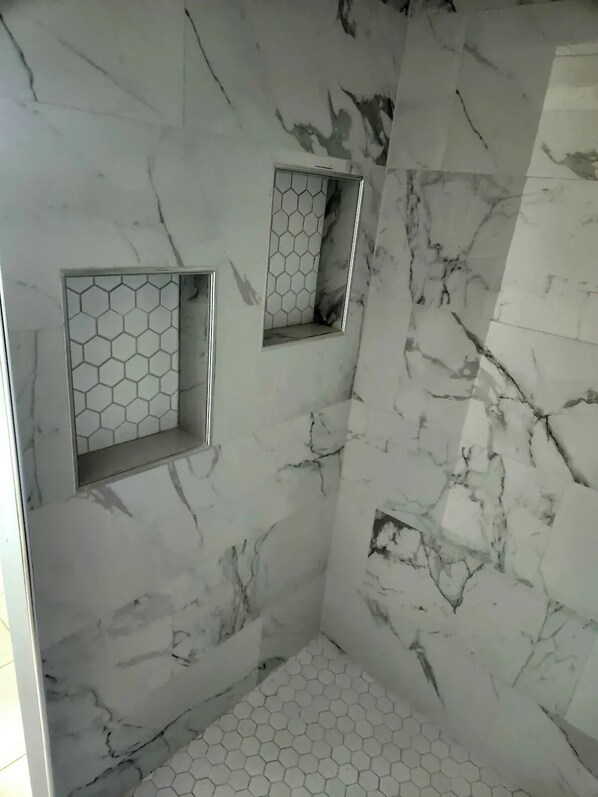 Shower, towels, soap, shampoo