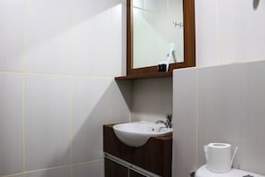 Deluxe Apartment | Bathroom - Restful 1Br Without Living Room Grand Kamala Lagoon Apartment (Bekasi)