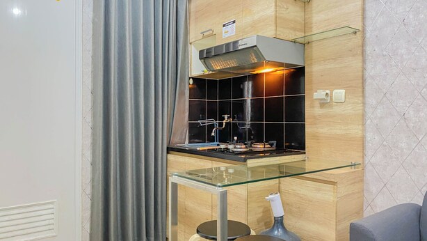 Appartement Deluxe | Cuisine privée | Réfrigérateur grande capacité avec congélateur, surface de cuisson