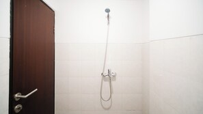 Deluxe Studio | Bathroom | Shower, towels - Simple And Comfortable Studio Apartment At Suncity Residence (Sidoarjo)