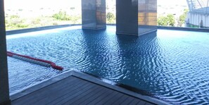 Outdoor pool - Nice And Comfortable Living 1Br At Grand Sungkono Lagoon Apartment (Surabaya)