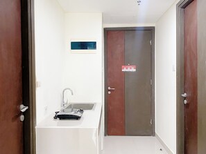 Private kitchen - Well Furnished And Cozy 2Br Pollux Chadstone Apartment (Cikarang)