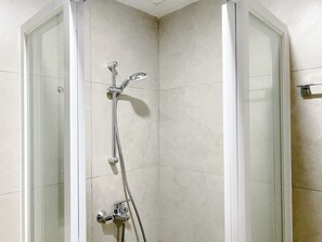 Deluxe Studio | Bathroom | Shower, towels - Good And Cozy Living Studio Pollux Chadstone Apartment (Cikarang)