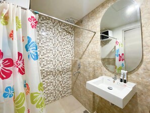 Shower, towels - Best Choice And Modern Studio At Apartment Mataram City (Ngaglik)