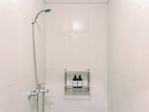 Deluxe Studio | Bathroom - Warm And Homey Studio At Royal Sentul Park Apartment (Bogor)