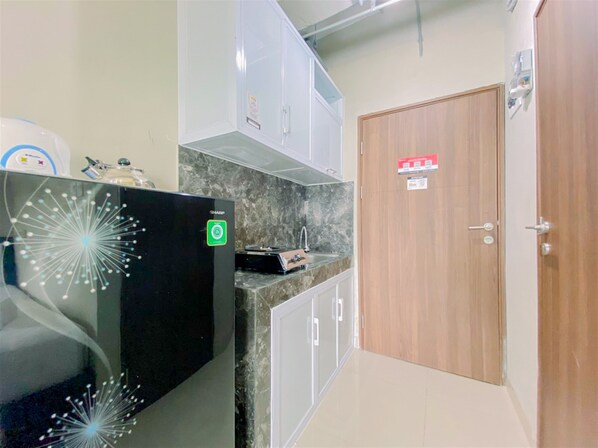 Deluxe Studio | Private kitchen - Warm And Homey Studio At Royal Sentul Park Apartment (Bogor)