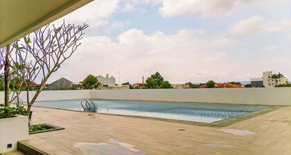 Comfortable And Homey Studio Room At Barsa City Apartment