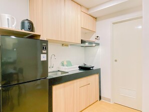 Huoneisto | Yksityinen keittiö | Jääkaappi, liesi, riisinkeitin, ruokailupöytä