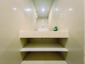 Apartment | Bathroom | Shower, towels, soap, shampoo - Simply And Modern Look 1Br At Tree Park City Bsd Apartment (South Tangerang)