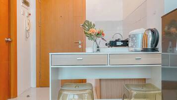 Apartment | Private kitchen | Fridge, stovetop, rice cooker, dining tables