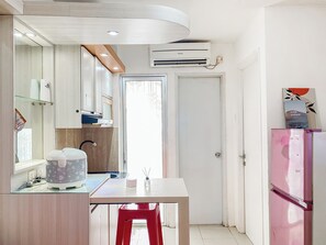 Private kitchen - Warm And Homey 2Br At Bassura City Apartment (Jakarta)