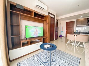 Apartamento Deluxe | Zona de estar