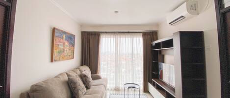 Deluxe Apartment | Living area