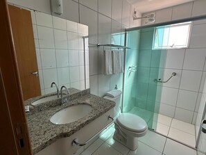 Shower, towels, soap, toilet paper