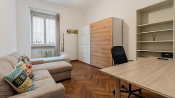 Departamento | 1 habitación, escritorio, tabla de planchar con plancha y internet