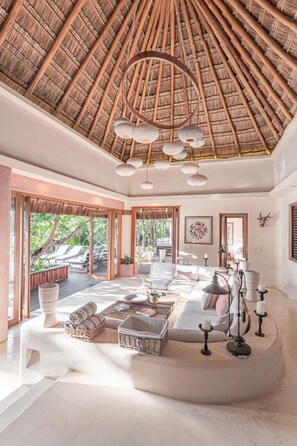 Villa, 4 Bedrooms, Beachfront | Living room | 55-inch LCD TV with digital channels - ANANA Casa Cantarena (Tulum)