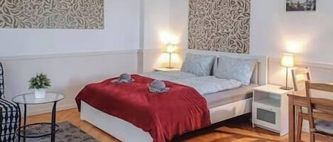 1 habitación, tabla de planchar con plancha, wifi y ropa de cama