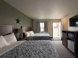 Tabla de planchar con plancha, wifi gratis y ropa de cama 