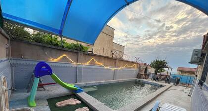 Sea-view villa with pool equipped with water slides and hydro-massage area
