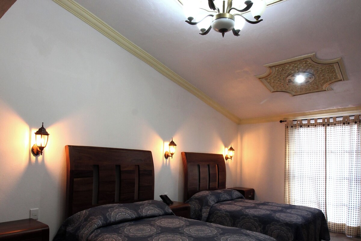2 Double beds with tub