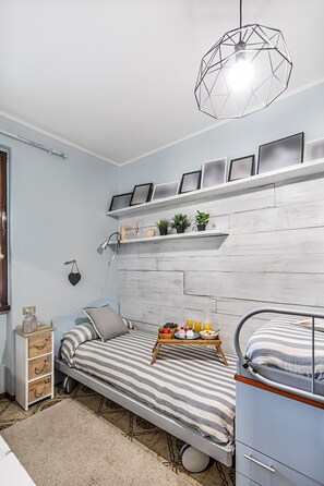 Appartement, vue jardin | 2 chambres, fer et planche à repasser, Wi-Fi gratuit