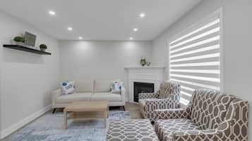 Family House | Living area | 55-inch Smart TV with satellite channels, Netflix, streaming services