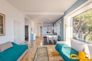 Apartment, Sea View | Living area | 35-inch TV with digital channels - Sky & Sea Apartment by Wonderful Italy (Ospedaletti)